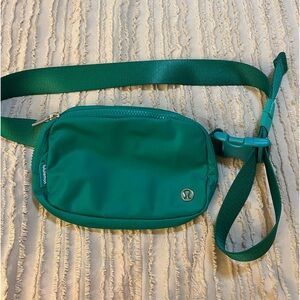 Authentic Lululwmon Everywhere Belt bag in green color. Great condition.